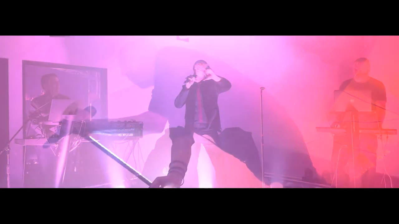 Screenshot of live performance video of electronic music group Blaklight with their song "Redefine.'